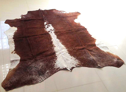 Genuine Cowhide Rug. Brown & white speckles.