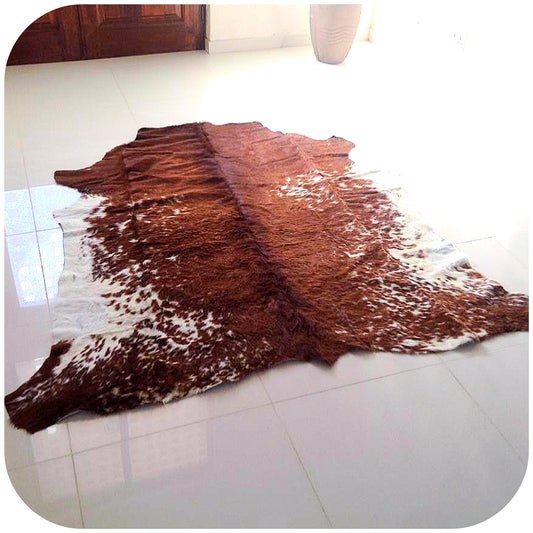 Genuine Cowhide Rug- Light Brown.
